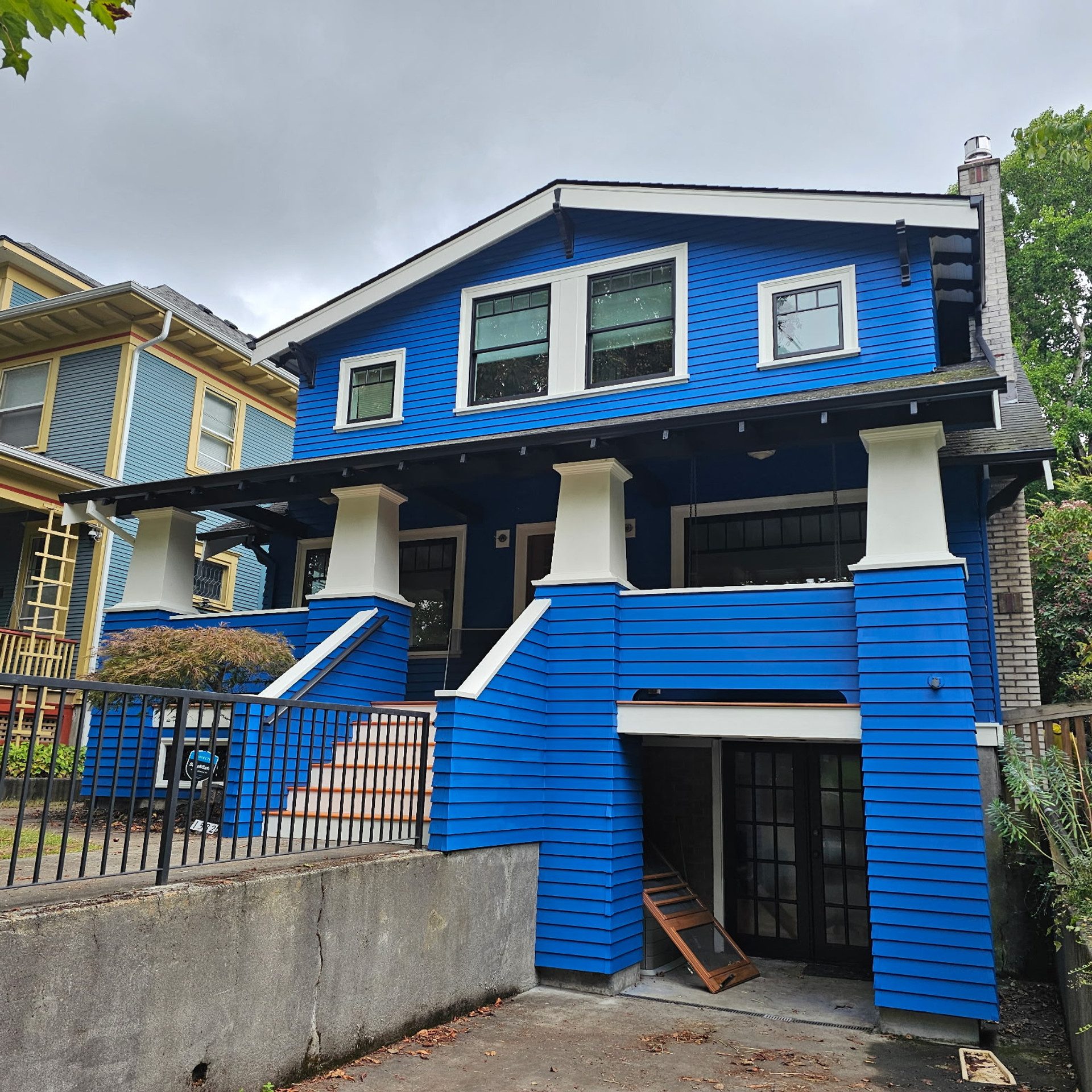 Royal blue Craftsman porch detail