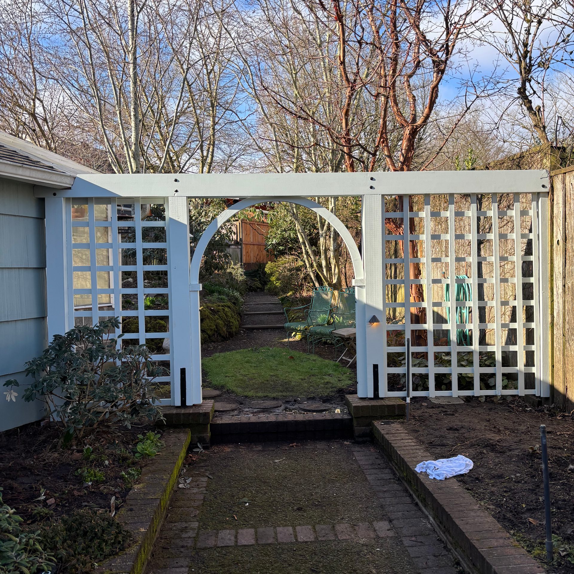 White garden trellis and arbor