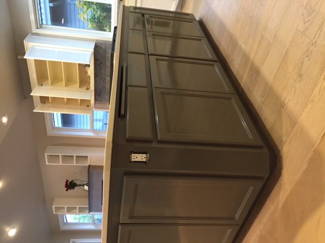 Gray kitchen island and cabinets