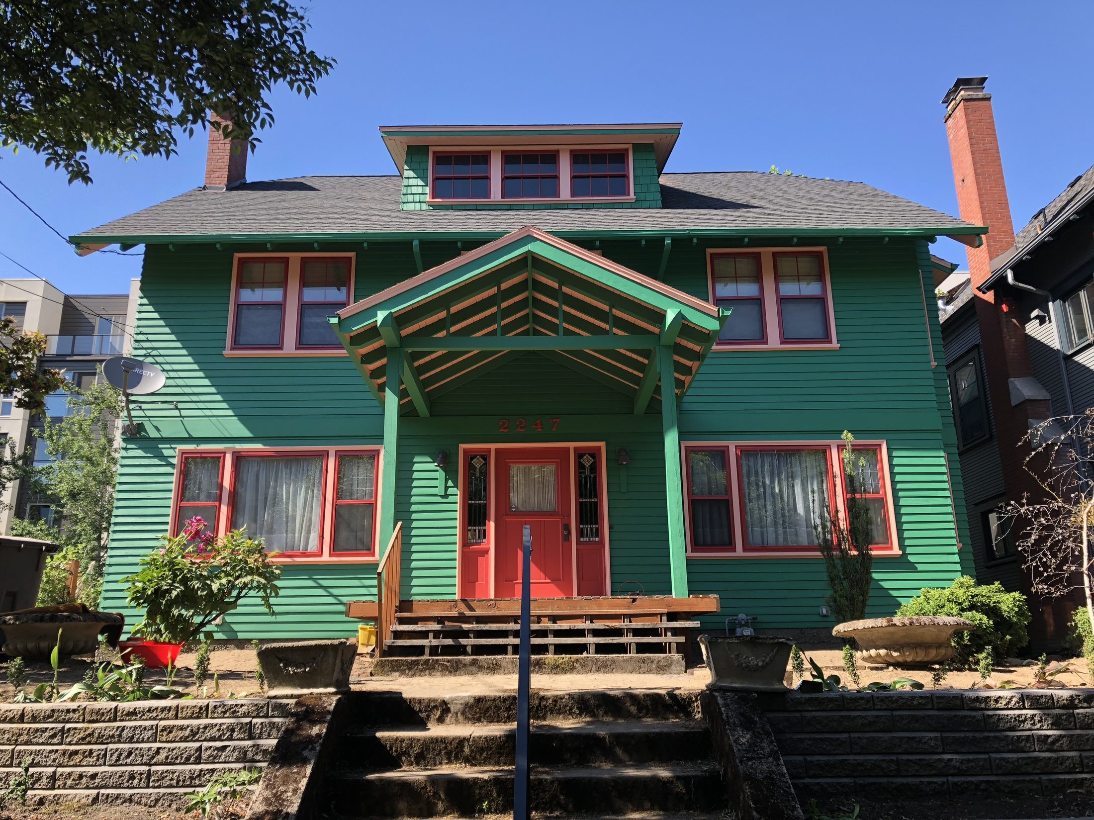 Green Foursquare with red door and trim